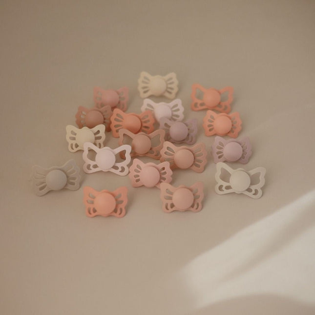 Frigg Speen Maat 1 Butterfly Cedar/Baby Pink Silicone 2 - Pack koop je bij Babywinkel