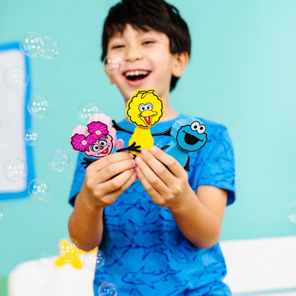 Glopals Badspeelgoed Sensorisch Light - Up Poppetje en Cubes Cookie koop je bij Babywinkel