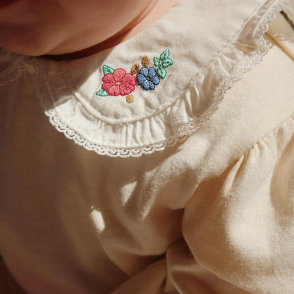 Konges Slojd Romper Pami Antique White koop je bij Babywinkel