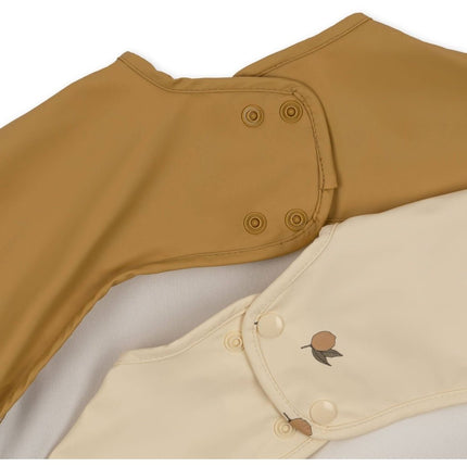 Konges Slojd Slabbetje Met Armen Lemon 30cm 2st koop je bij Babywinkel