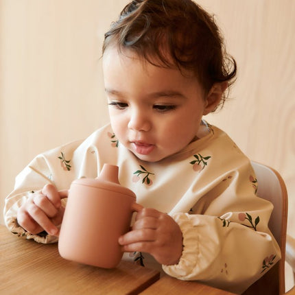 Liewood Slabbetje Merle Peach/Sea Shell koop je bij Babywinkel