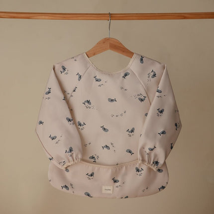 Mushie Slabbetje Long Sleeve Whales koop je bij Babywinkel