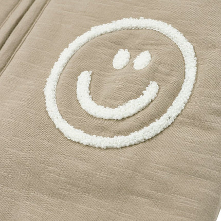 Meyco Baby Slub Met Smile Applicatie Baby Slaapzak Met Afritsbare Mouwen Taupe/Offwhite koop je bij Babywinkel