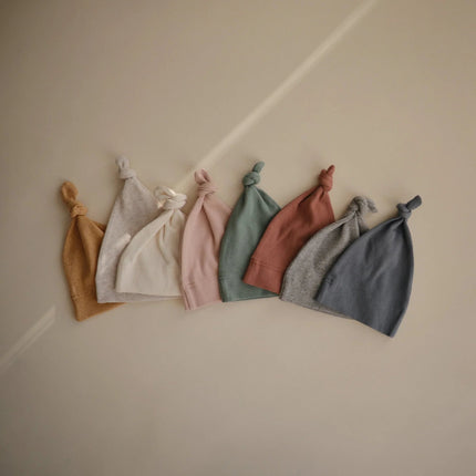 Mushie Babymutsje Mustard Melange koop je bij Babywinkel