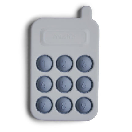 Mushie Educatief Speelgoed Druk Telefoon Tradewinds koop je bij Babywinkel