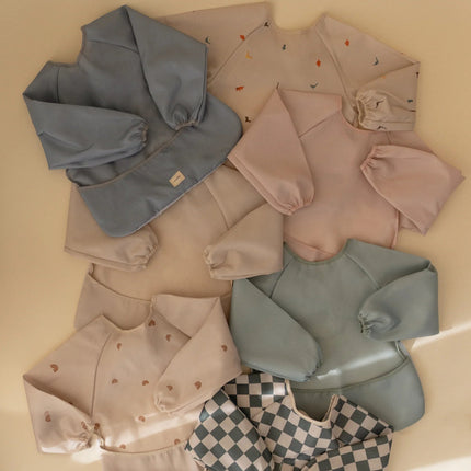 Mushie Slabbetje Lange Mouwen Blush koop je bij Babywinkel