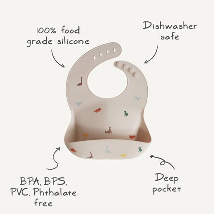 Mushie Slabbetje Silicone Dino koop je bij Babywinkel